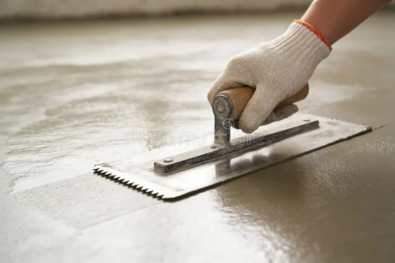 construction-worker-smoothing-wet-concrete-floor-trowel-perfect-finish-gloved-hand-uses-to-level-smooth-freshly-435841746